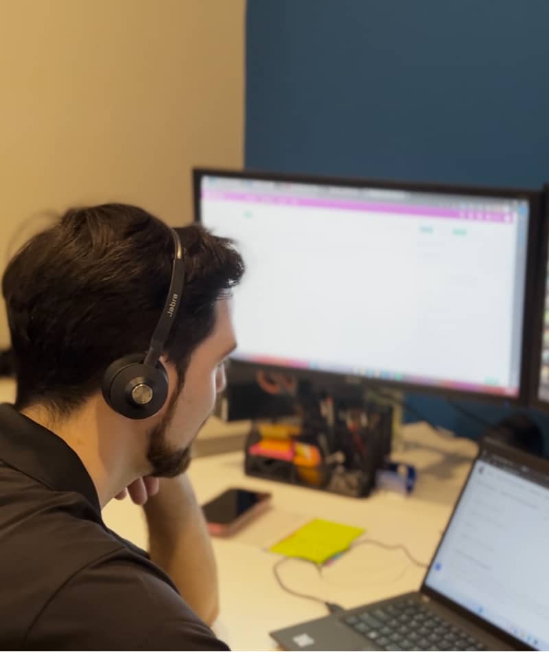 A Network Builders team member providing Converse IT support for a client.